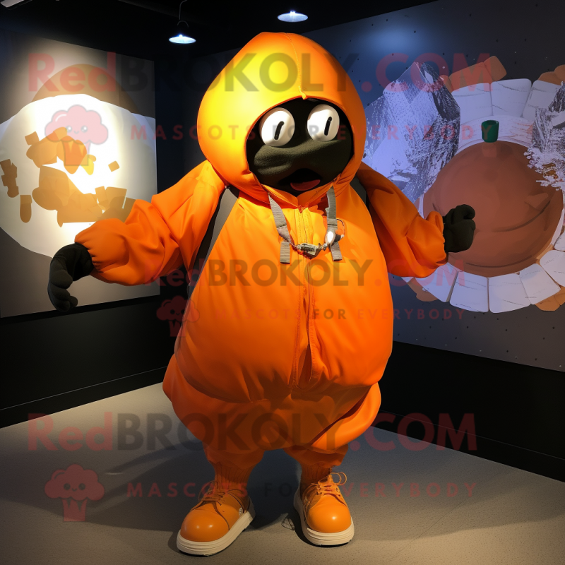 Orange Grenade mascot costume character dressed with a Parka and Messenger bags