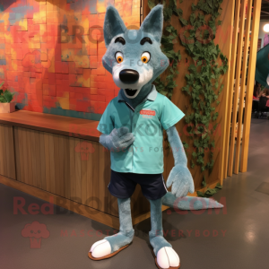 Teal Dingo mascot costume character dressed with a Denim Shorts and Shoe laces