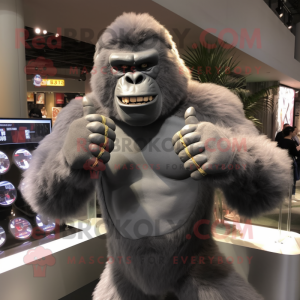 Gray Gorilla mascot costume character dressed with a Graphic Tee and Bracelet watches