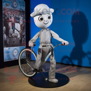 Silver Unicyclist mascot costume character dressed with a Oxford Shirt and Shawls