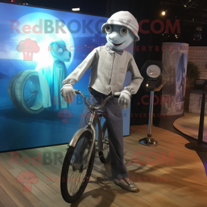 Silver Unicyclist mascot costume character dressed with a Oxford Shirt and Shawls
