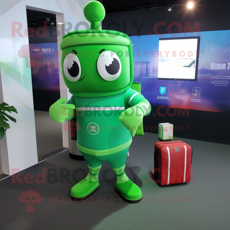 Green Scented Candle mascot costume character dressed with a Rash Guard and Messenger bags Green Scented Candle mascot costume character dressed with a Rash Guard and Messenger bags