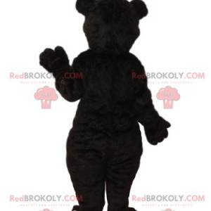 Mascotte dell'orso bruno con un grande muso rosso -