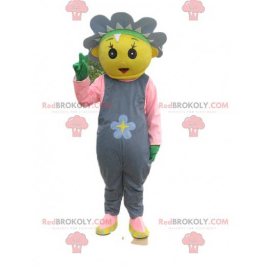 Gul karakter maskot med en blomst og grå kjeledress -