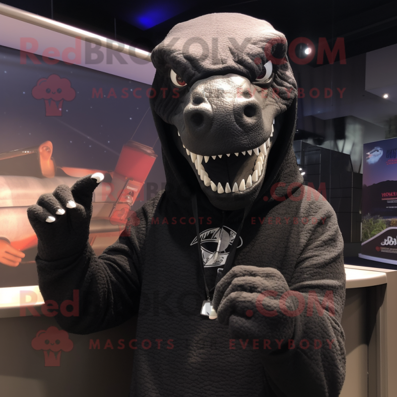 Black Tyrannosaurus mascot costume character dressed with a Hoodie and Shawl pins