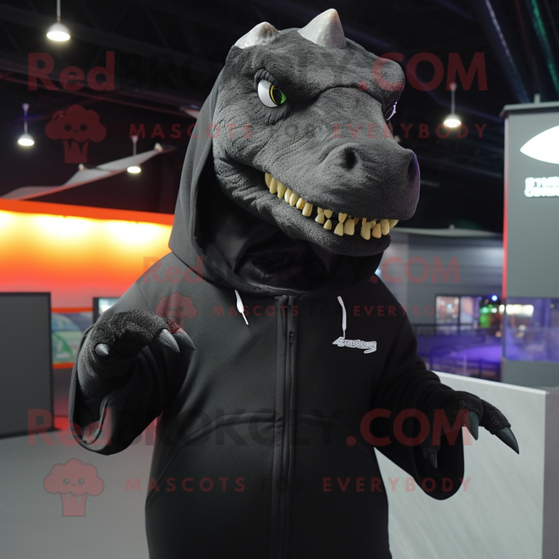 Black Tyrannosaurus mascot costume character dressed with a Hoodie and Shawl pins