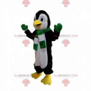 Black and white penguin mascot with a green and white scarf -