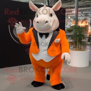 Orange Rhinoceros mascot costume character dressed with a Tuxedo and Rings