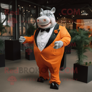 Orange Rhinoceros mascot costume character dressed with a Tuxedo and Rings