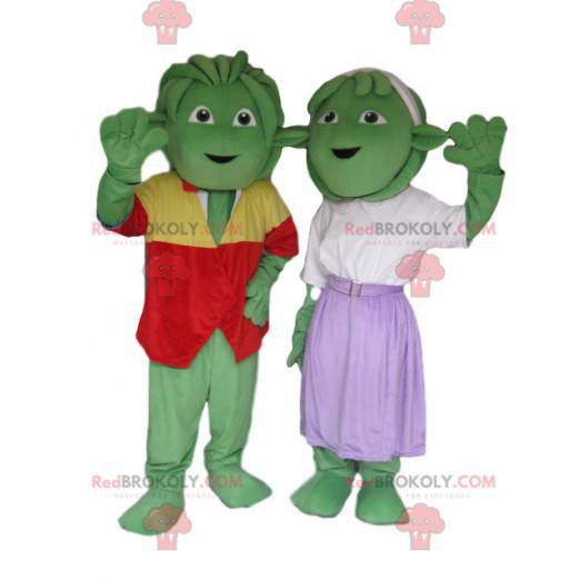 Duo de mascotes de criaturas verdes muito alegres e bem