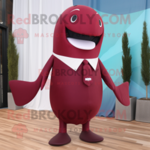 Maroon Whale mascot costume character dressed with a Sheath Dress and Tie pins