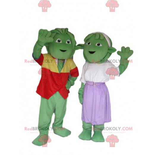 Duo mascotte di creature verdi molto allegro e ben vestito -