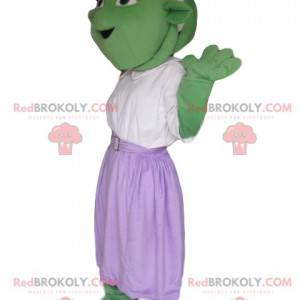 Criatura mascote verde com saia roxa - Redbrokoly.com