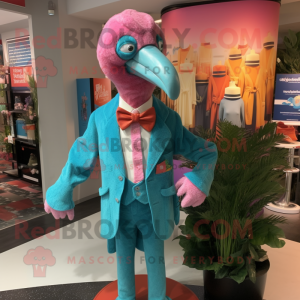 Turquoise Flamingo mascot costume character dressed with a Waistcoat and Hat pins