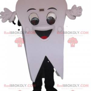 Mascotte de dent blanche très joyeuse. Costume de dent -