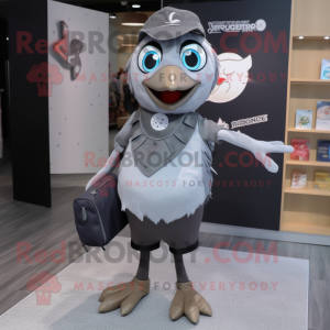 Silver Blackbird mascot costume character dressed with a Skinny Jeans and Messenger bags