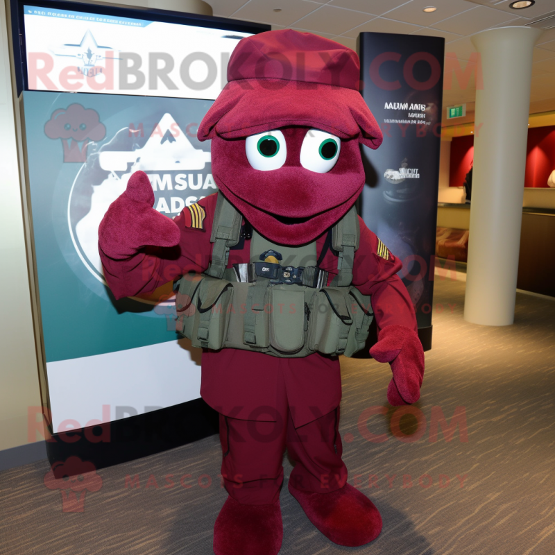 Maroon Marine Recon mascot costume character dressed with a T-Shirt and Shawls