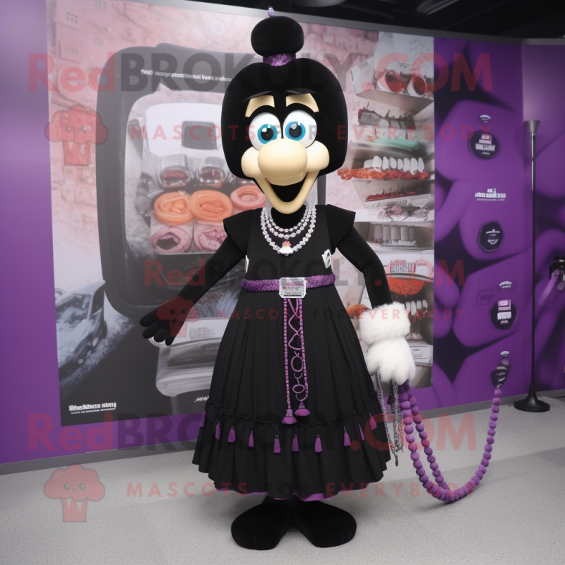 Black Moussaka mascot costume character dressed with a Empire Waist Dress and Keychains Black Moussaka mascot costume character dressed with a Empire Waist Dress and Keychains