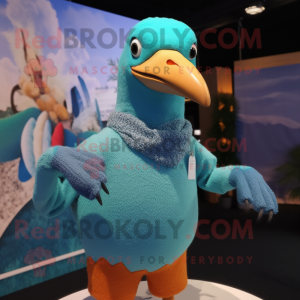 Turquoise Passenger Pigeon mascot costume character dressed with a Sweater and Beanies