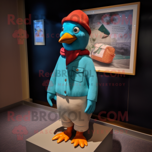 Turquoise Passenger Pigeon mascot costume character dressed with a Sweater and Beanies