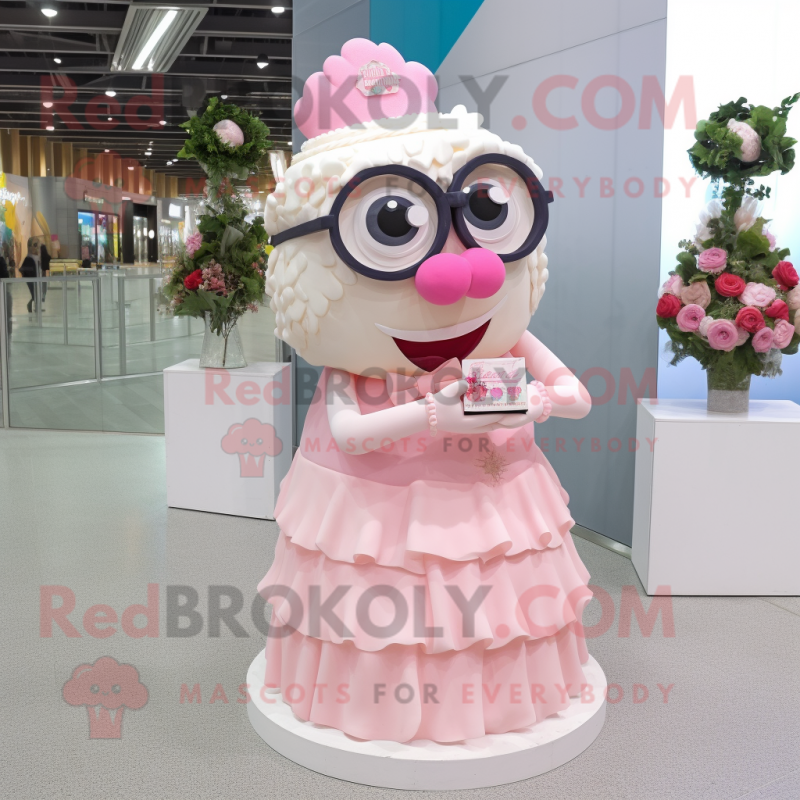 Pink Wedding Cake mascot costume character dressed with a Dress and Eyeglasses Pink Wedding Cake mascot costume character dressed with a Dress and Eyeglasses
