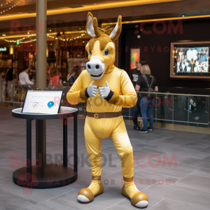 Gold Donkey mascot costume character dressed with a Skinny Jeans and Smartwatches