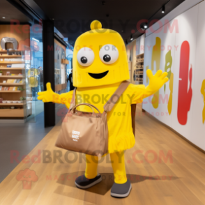 Yellow Pho mascot costume character dressed with a Graphic Tee and Tote bags