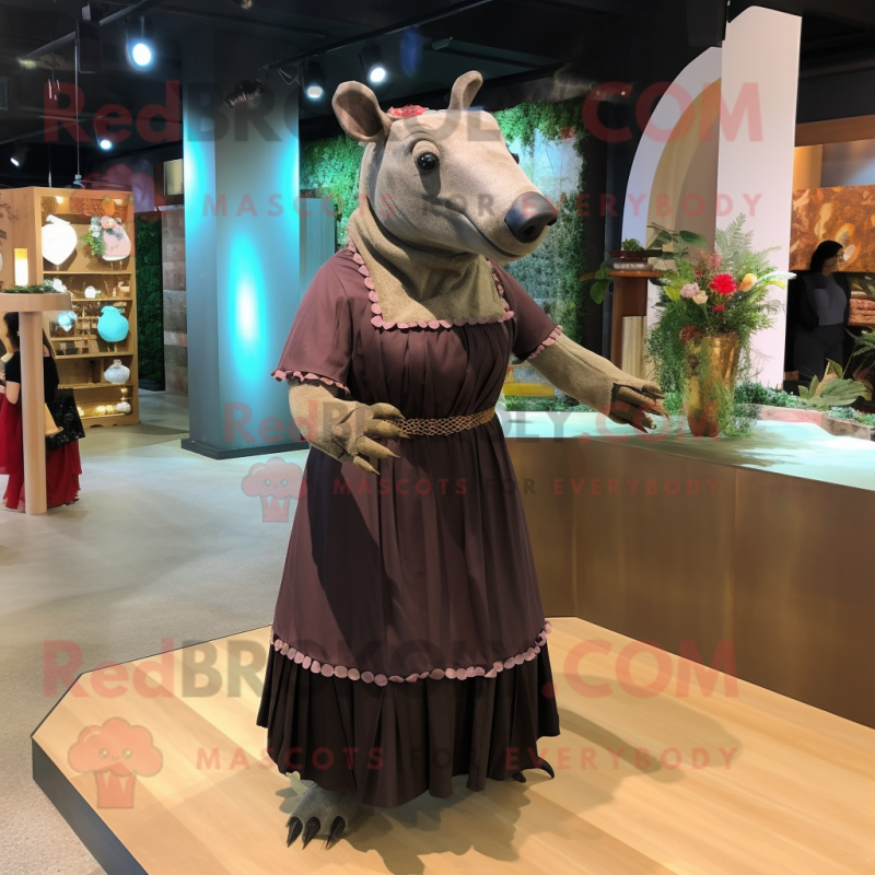 Brown Tapir mascot costume character dressed with a Empire Waist Dress and Headbands