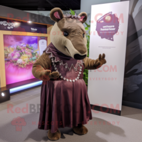 Brown Tapir mascot costume character dressed with a Empire Waist Dress and Headbands