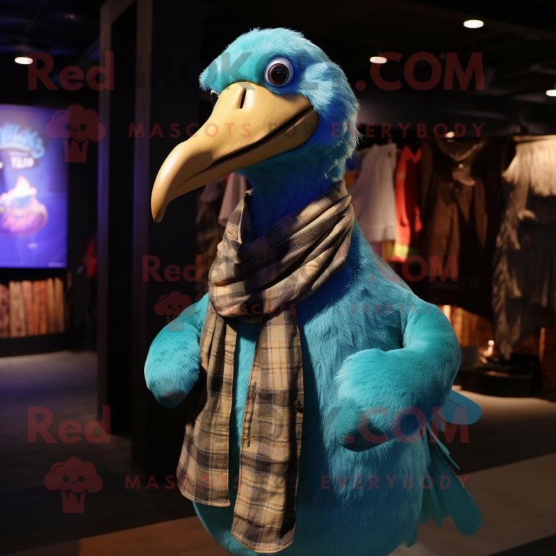 Cyan Dodo Bird mascot costume character dressed with a Flannel Shirt and Shawl pins