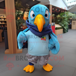 Sky Blue Toucan mascot costume character dressed with a Hoodie and Pocket squares