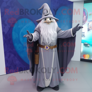 Gray Wizard mascot costume character dressed with a A-Line Dress and Scarf clips