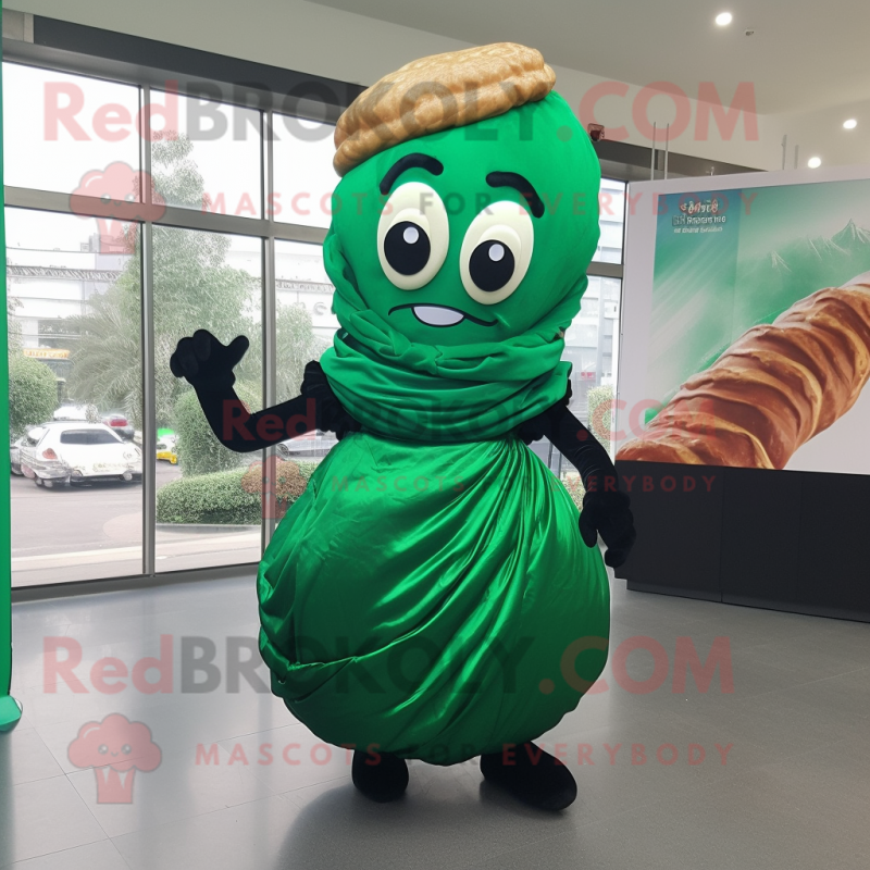 Forest Green Croissant mascot costume character dressed with a Evening Gown and Keychains Forest Green Croissant mascot costume character dressed with a Evening Gown and Keychains