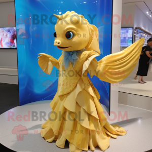 Gold Betta Fish mascot costume character dressed with a A-Line Dress and Shawl pins