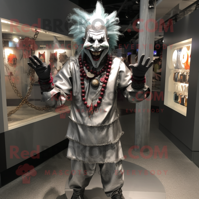 Silver Evil Clown mascot costume character dressed with a Henley Shirt and Necklaces Silver Evil Clown mascot costume character dressed with a Henley Shirt and Necklaces