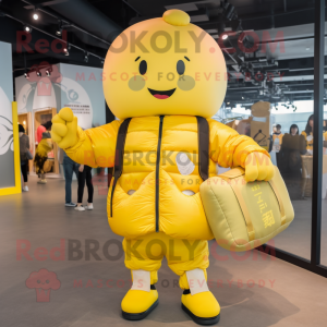 Yellow Dim Sum mascot costume character dressed with a Bomber Jacket and Messenger bags