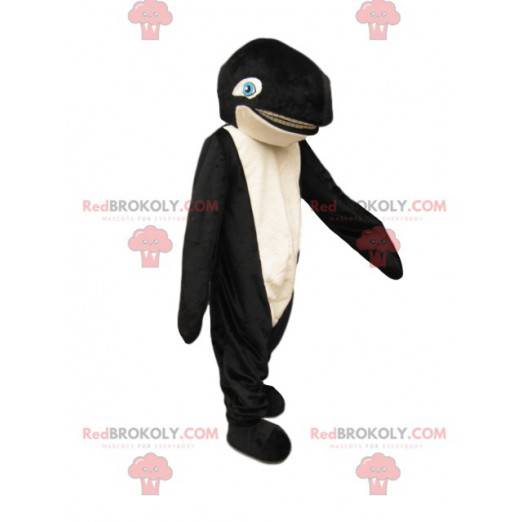 Mascota de ballena asesina en blanco y negro con ojos azules -