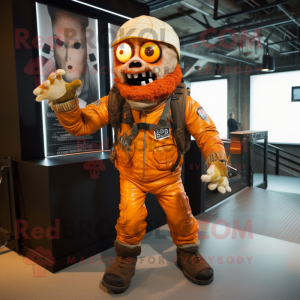 Orange Zombie mascot costume character dressed with a Moto Jacket and Shoe laces