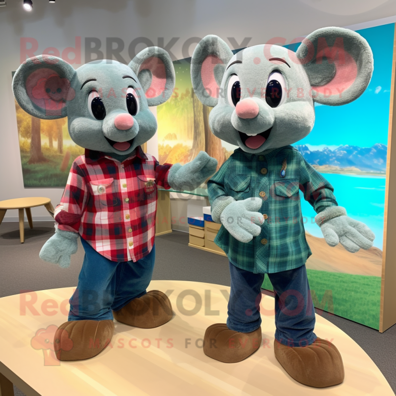 Turquoise Mouse mascot costume character dressed with a Flannel Shirt and Watches Turquoise Mouse mascot costume character dressed with a Flannel Shirt and Watches