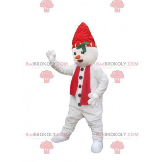 Schneemann Maskottchen mit einer Mütze und einem roten Schal -