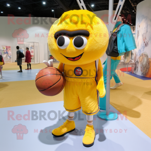 Yellow Basketball Ball mascot costume character dressed with a Bermuda Shorts and Messenger bags