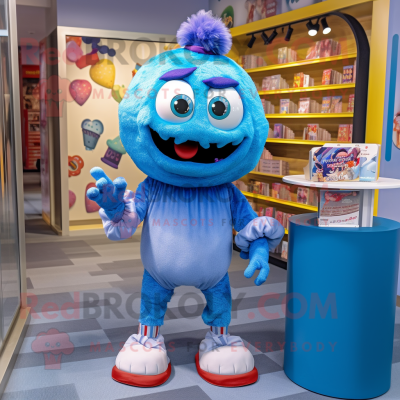 Blue Cupcake mascot costume character dressed with a Oxford Shirt and Anklets