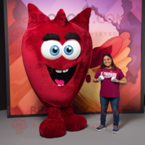 Maroon Heart mascot costume character dressed with a Flare Jeans and Watches