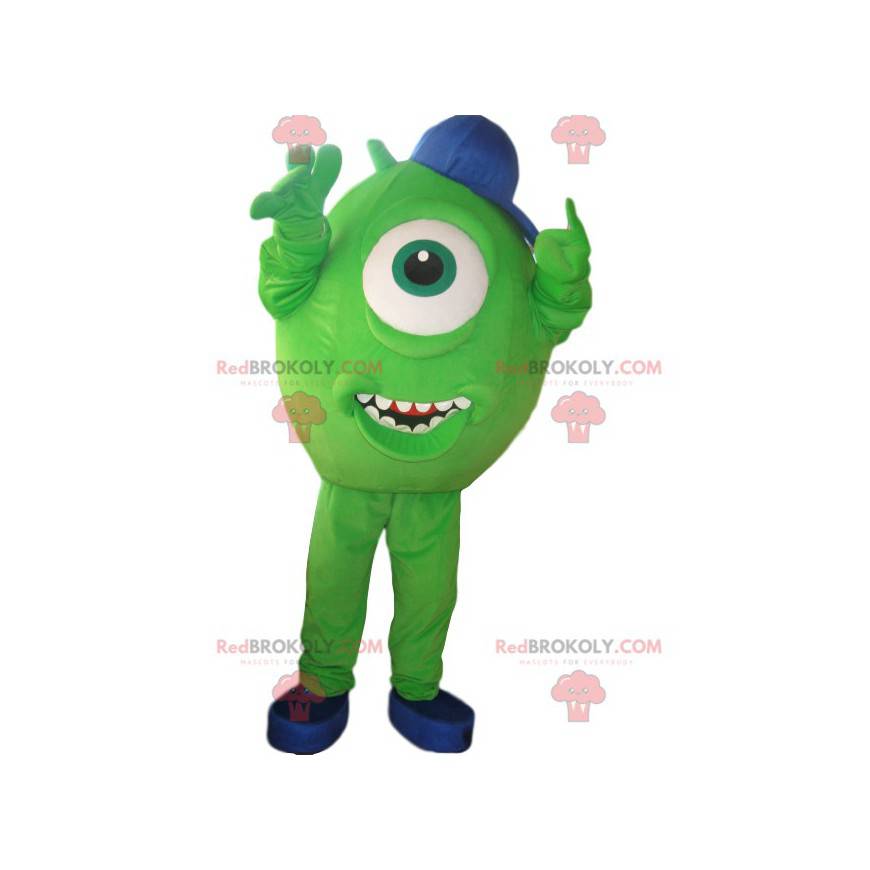 Mascotte de cyclope vert avec une casquette bleue -