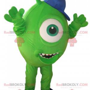 Mascota cíclope verde con gorra azul - Redbrokoly.com