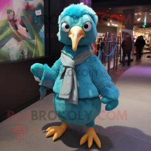 Turquoise Dodo Bird mascot costume character dressed with a Parka and Bow ties