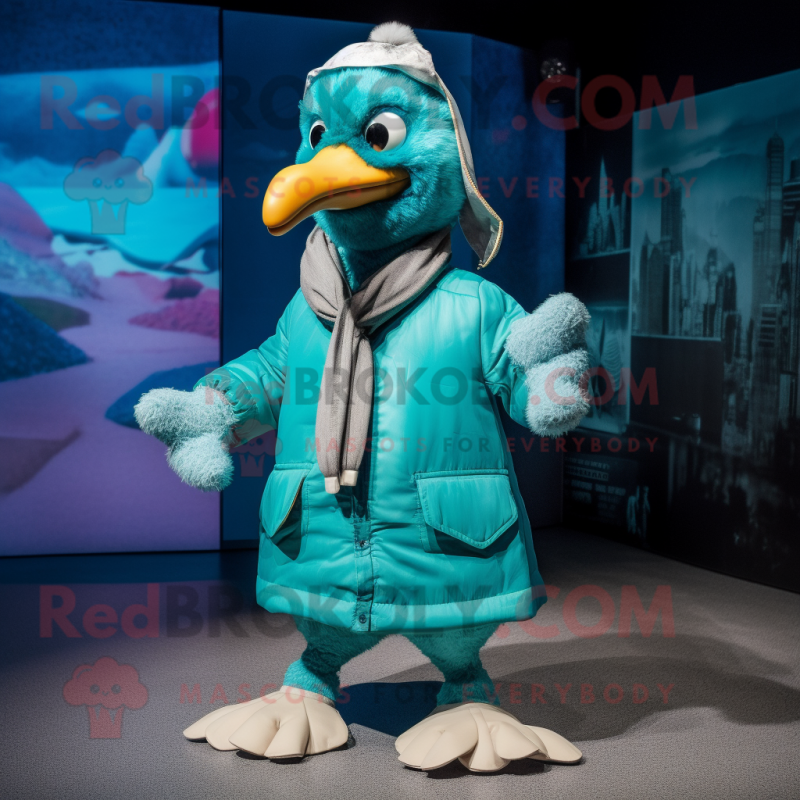 Turquoise Dodo Bird mascot costume character dressed with a Parka and Bow ties Turquoise Dodo Bird mascot costume character dressed with a Parka and Bow ties