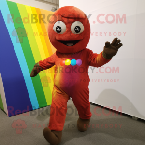 Rust Rainbow mascot costume character dressed with a Jumpsuit and Foot pads
