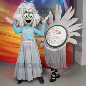 Silver Paella mascot costume character dressed with a Maxi Dress and Smartwatches