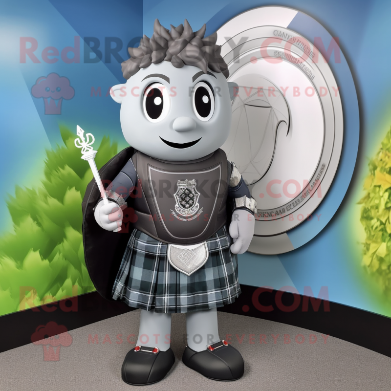 Gray Celtic Shield mascot costume character dressed with a Tuxedo and Backpacks Gray Celtic Shield mascot costume character dressed with a Tuxedo and Backpacks